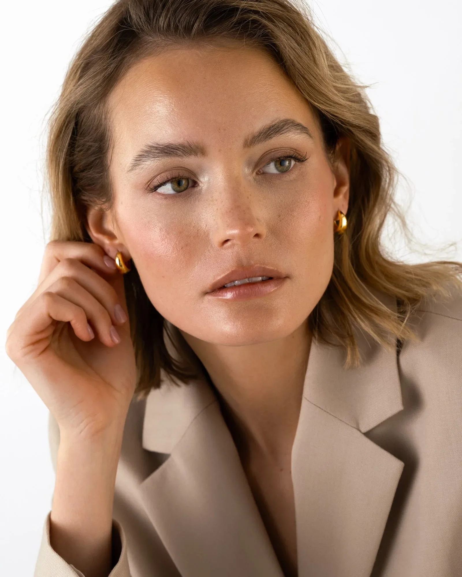 Gold plated steel bold hoop earrings